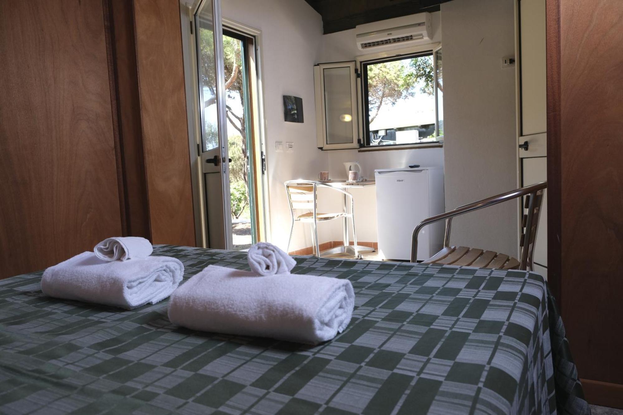 Villaggio Camping Torre Del Porticciolo Porto Conte Ruang foto