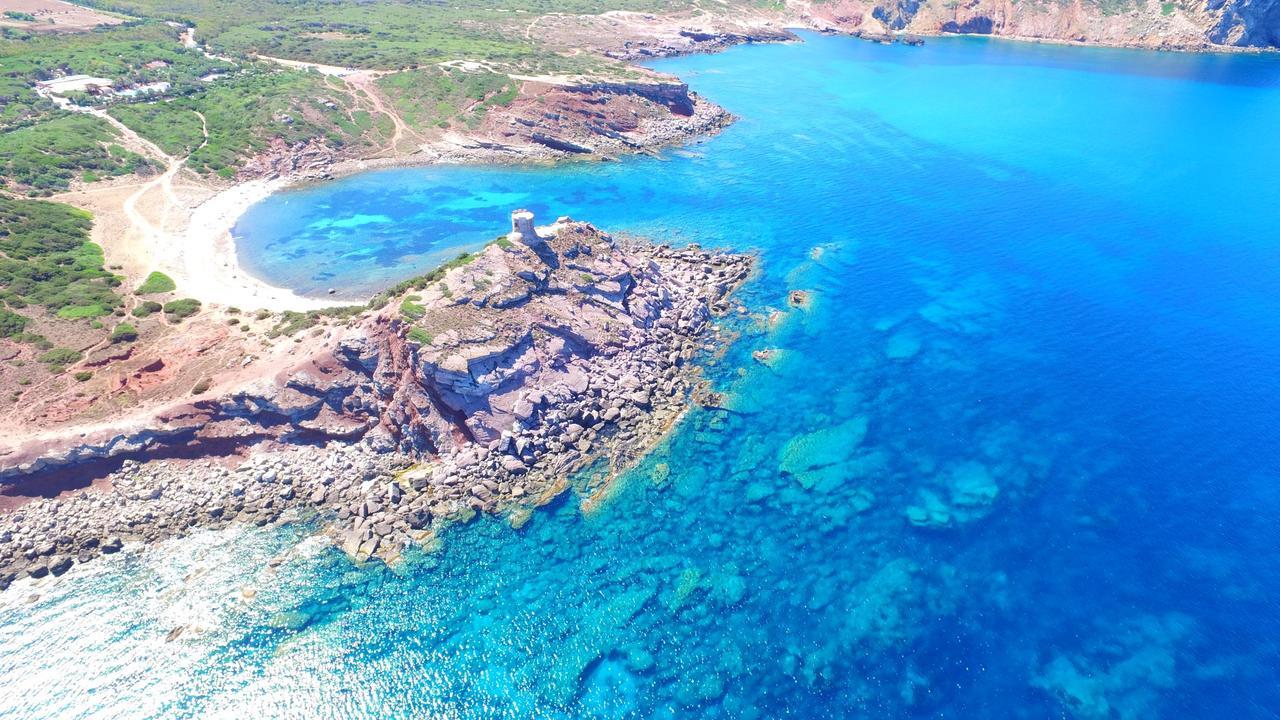 Villaggio Camping Torre Del Porticciolo Porto Conte Bagian luar foto